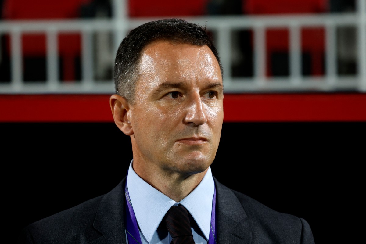 China's Serbian coach Aleksandar Jankovic looks on before the start of the Qatar 2023 AFC Asian Cup Group A football match between China and Tajikistan at the Abdullah bin Khalifa Stadium in Doha on January 13, 2024. (Photo by KARIM JAAFAR / AFP)
