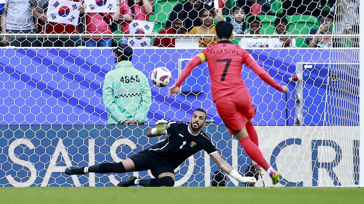 South Korea's Son Heung-Min scores his team's first goal against Jordan from the penalty spot. Pictures: Rajan Vadakkemuriyil 