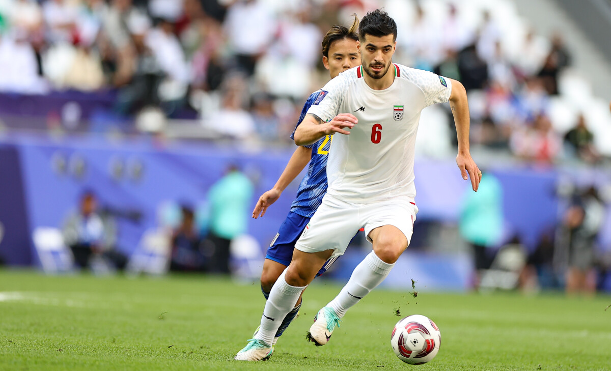 Iran's Saeid Ezzatolahi in action during quarter-final against Japan.