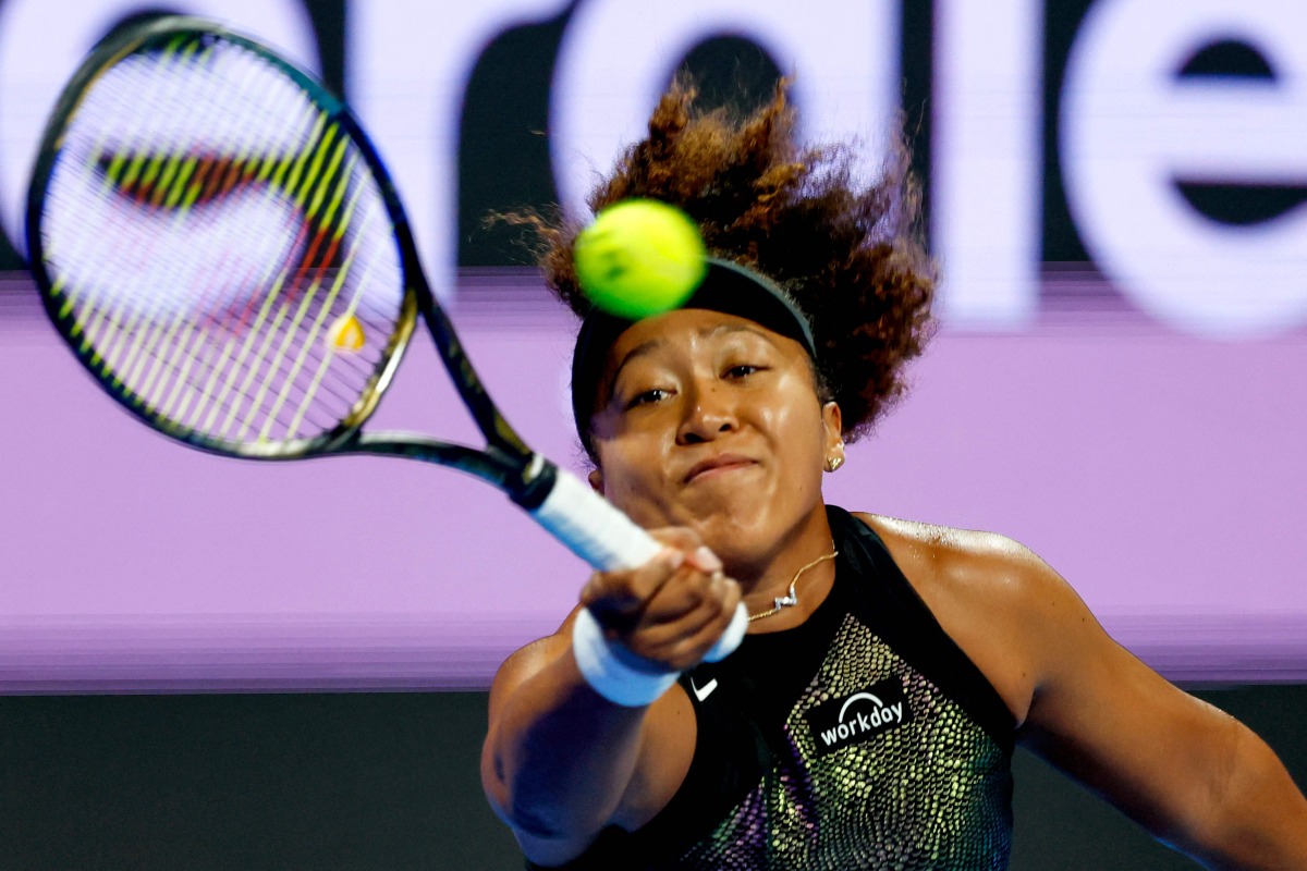 Japan’s Naomi Osaka hits a return against France’s Caroline Garcia during their first round match. AFP