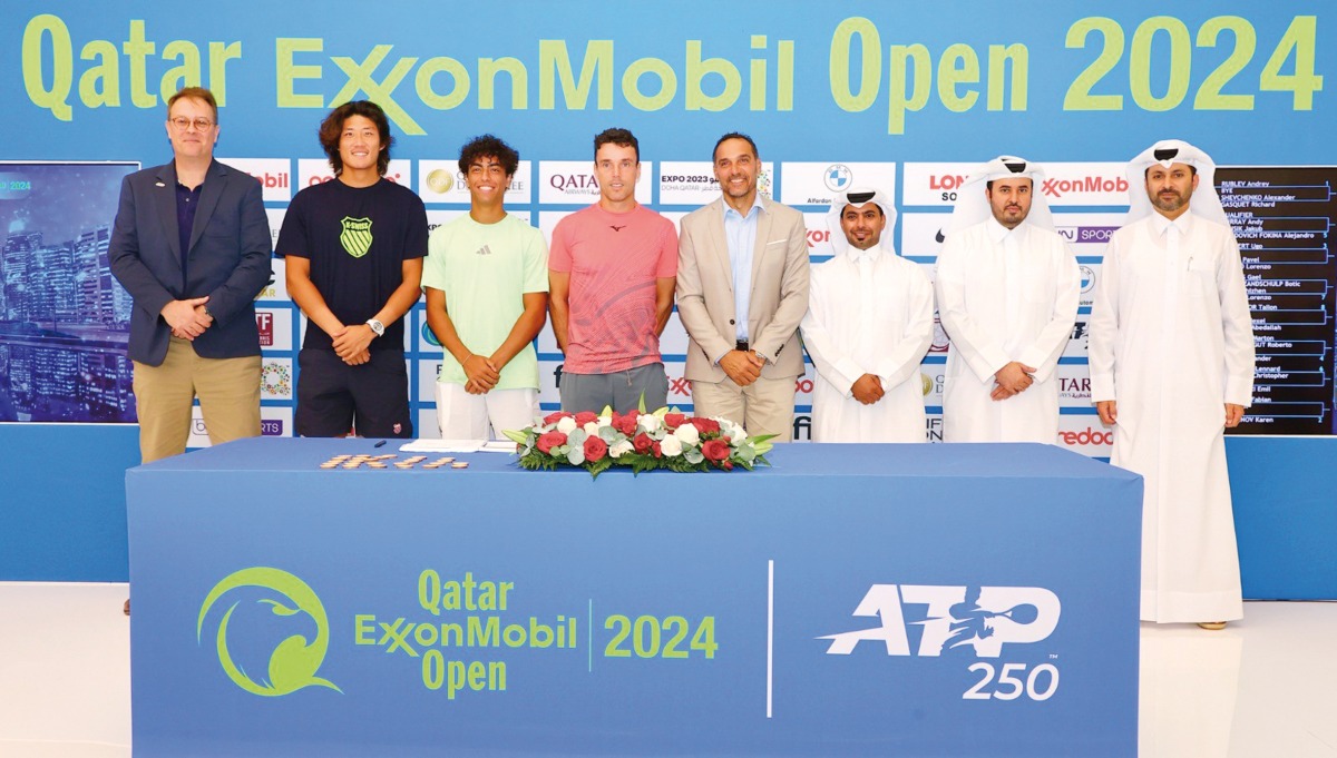 Roberto Bautista Agut of Spain, Qatar ExxonMobil champion in 2019 and 2022, along with Tournament Director Karim Alami, players Zhizhen Zhang of China and Abdullah Shelbayh of Jordan, Qatar ExxonMobil officials, QTF Executive Director Saad Al Mohannadi, and ATP Supervisor Roland Herfel soon after the draw ceremony at the Khalifa International Tennis & Sports Complex, yesterday.