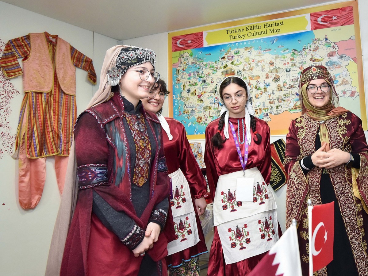 Students in traditional costumes.