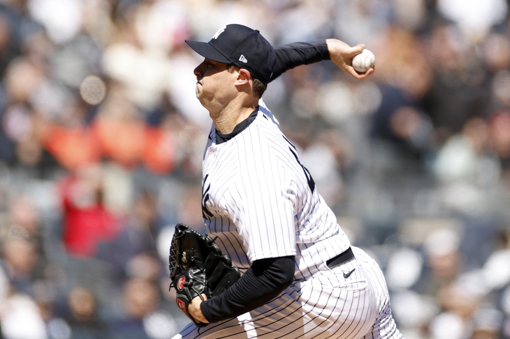 Gerrit Cole #45 of the New York Yankees pitches during the first inning against the San Francisco Giants on Opening Day at Yankee Stadium on March 30, 2023 in the Bronx borough of New York City. (Photo by Sarah Stier / GETTY IMAGES NORTH AMERICA / Getty Images via AFP)

