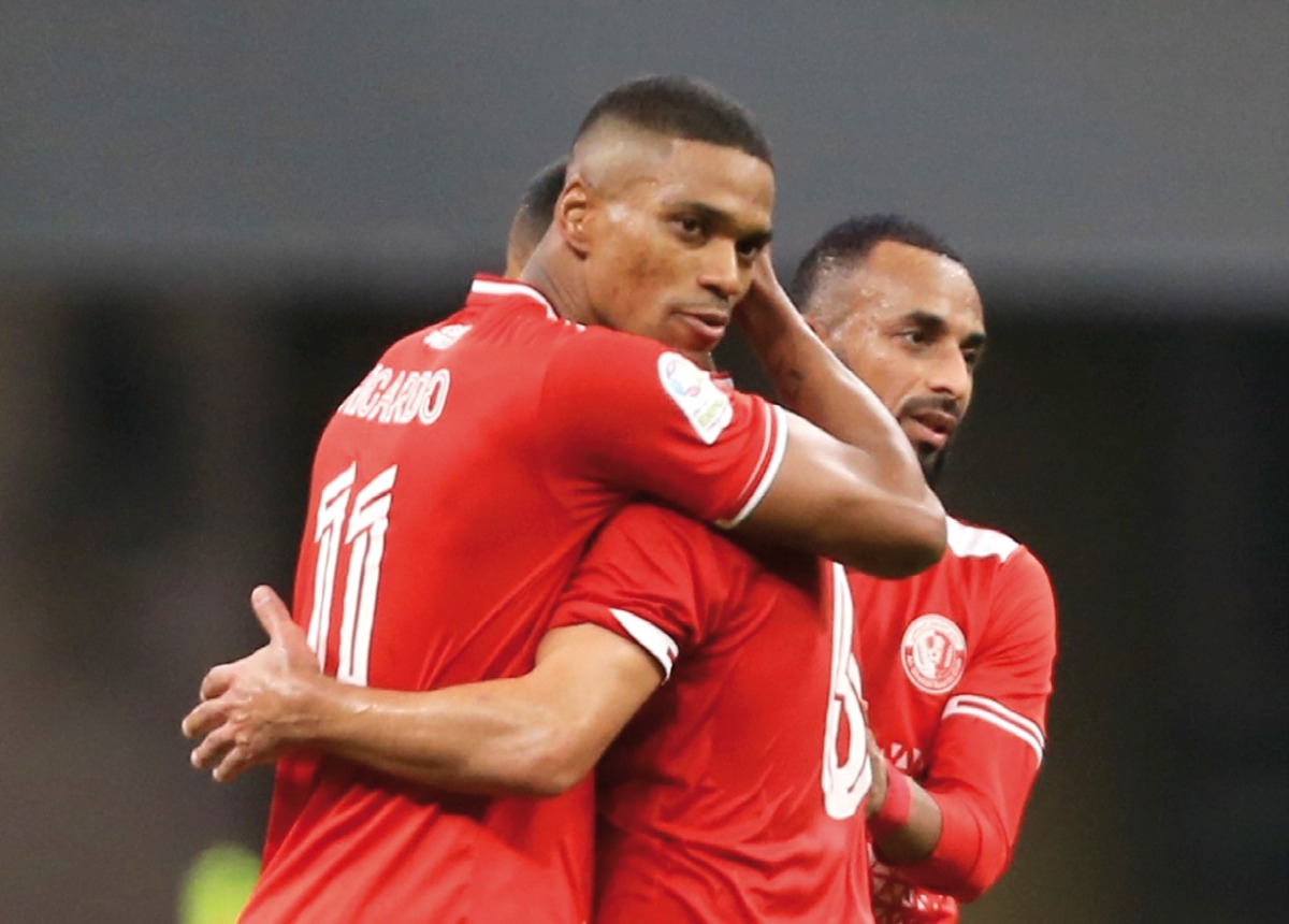 Al Shamal’s Ricardo Gomes (left) celebrates with a teammate after scoring a goal.