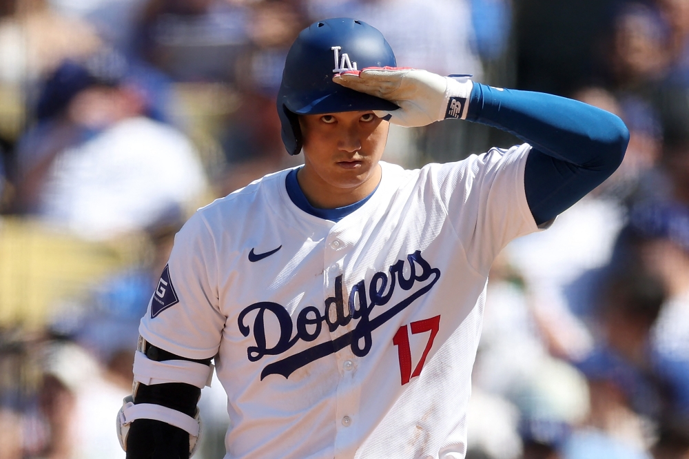 Shohei Ohtani #17 of the Los Angeles Dodgers looks on during his at bat in the seventh inning of a game against the St. Louis Cardinals at Dodger Stadium on March 28, 2024 in Los Angeles, California. (Photo by Sean M. Haffey / GETTY IMAGES NORTH AMERICA / Getty Images via AFP)
