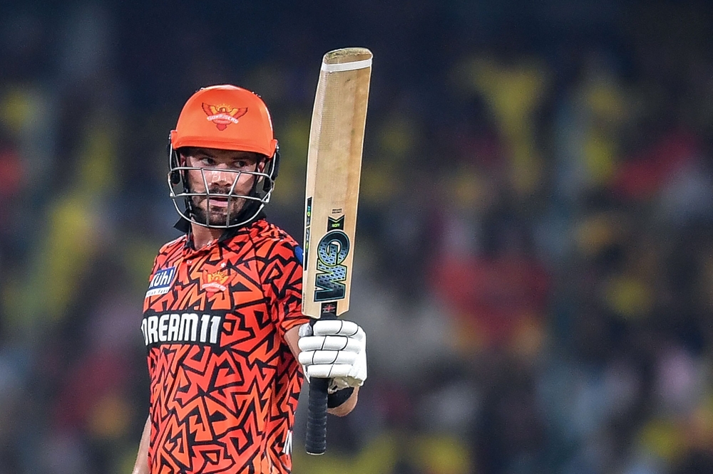 Sunrisers Hyderabad's Aiden Markram celebrates after scoring a half-century (50 runs) during the Indian Premier League (IPL) Twenty20 cricket match between Sunrisers Hyderabad and Chennai Super Kings at the Rajiv Gandhi International Stadium in Hyderabad on April 5, 2024. (Photo by Noah SEELAM / AFP)