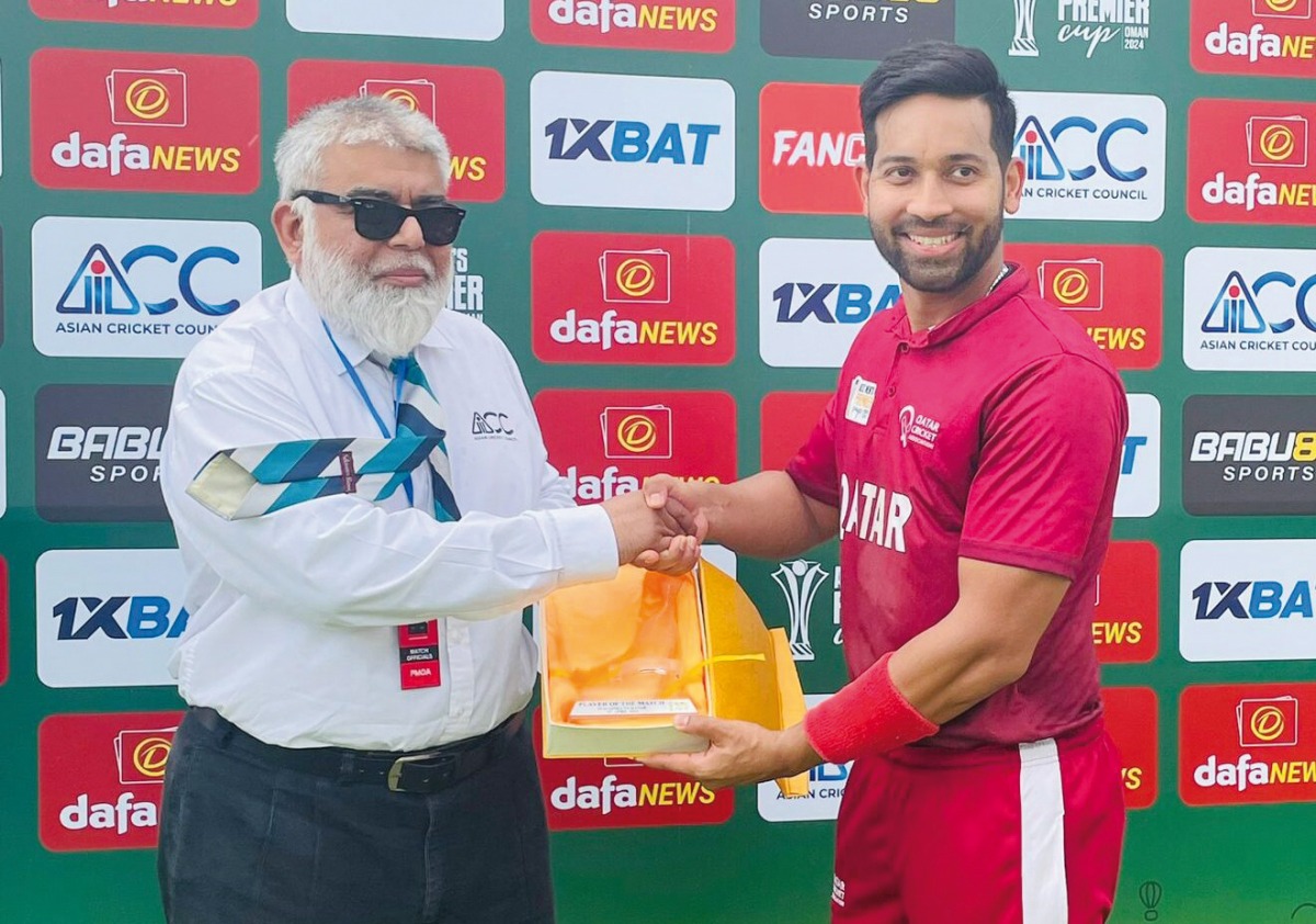 Himanshu Rathod receives his man-of-the -match award