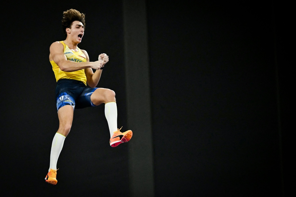 (Files) Sweden's Armand Duplantis competes in the Men's Pole Vault final during the Indoor World Athletics Championships in Glasgow, Scotland, on March 3, 2024. (Photo by Ben Stansall / AFP)