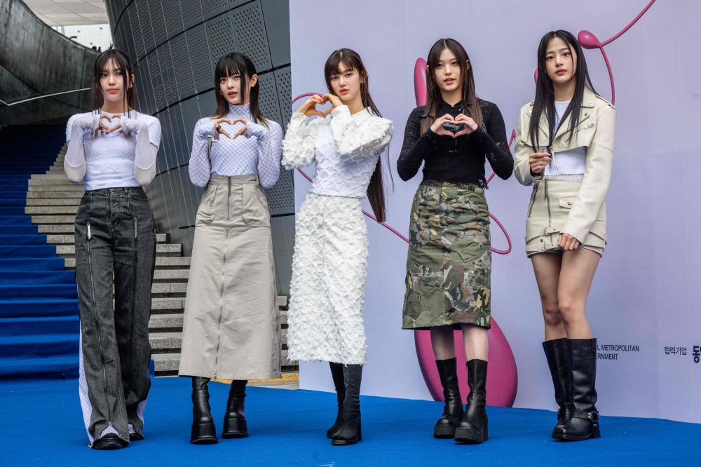 Members of South Korean K-pop group NewJeans pose on the blue carpet at Seoul Fashion Week at Dongdaemun Design Plaza in Seoul on March 15, 2023. Photo by ANTHONY WALLACE / AFP