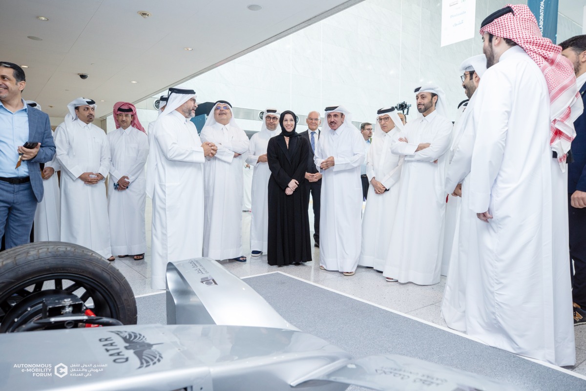 Minister of Transport H E Jassim Saif Ahmed Al Sulaiti, Minister of Education and Higher Education H E Buthaina bint Ali Al Jabr Al Nuaimi, Minister of Municipality H E Abdullah bin Hamad bin Abdullah Al Attiyah, and other officials touring an exhibition at Autonomous e-Mobility Forum at QNCC yesterday.