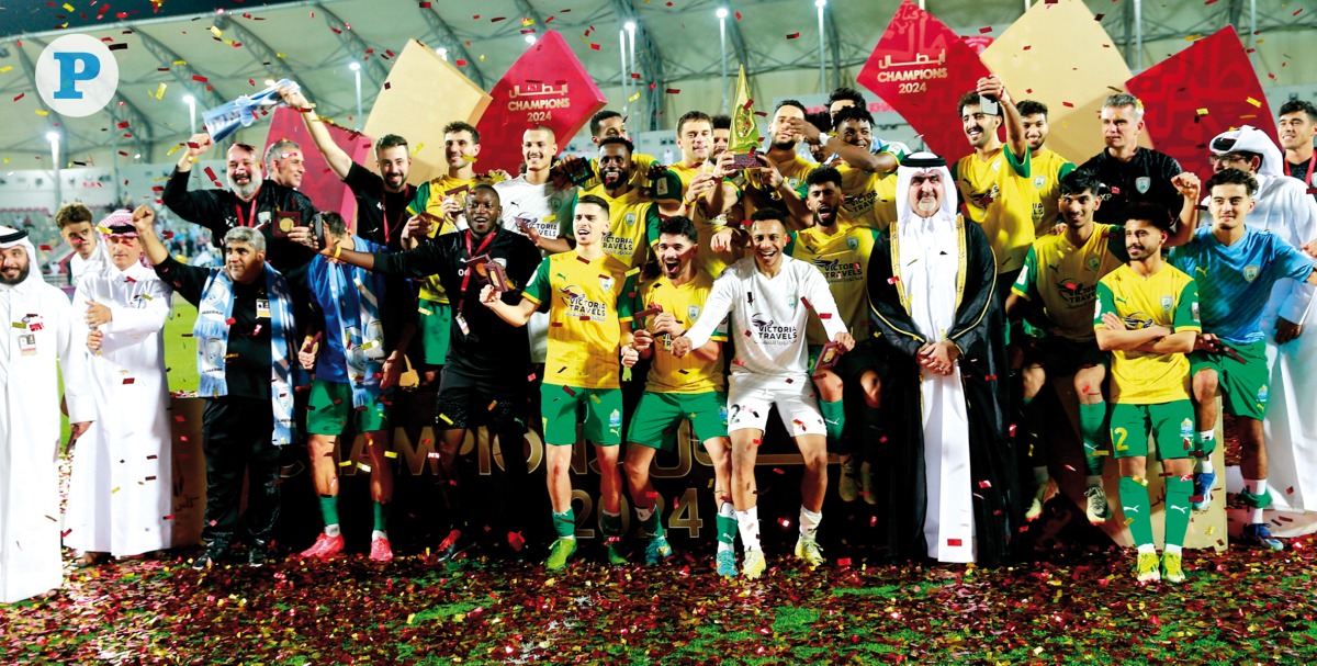 Al Wakrah players and officials celebrate after winning the Qatar Cup. Pic: Rajan Vadakkemuriyil / The Peninsula