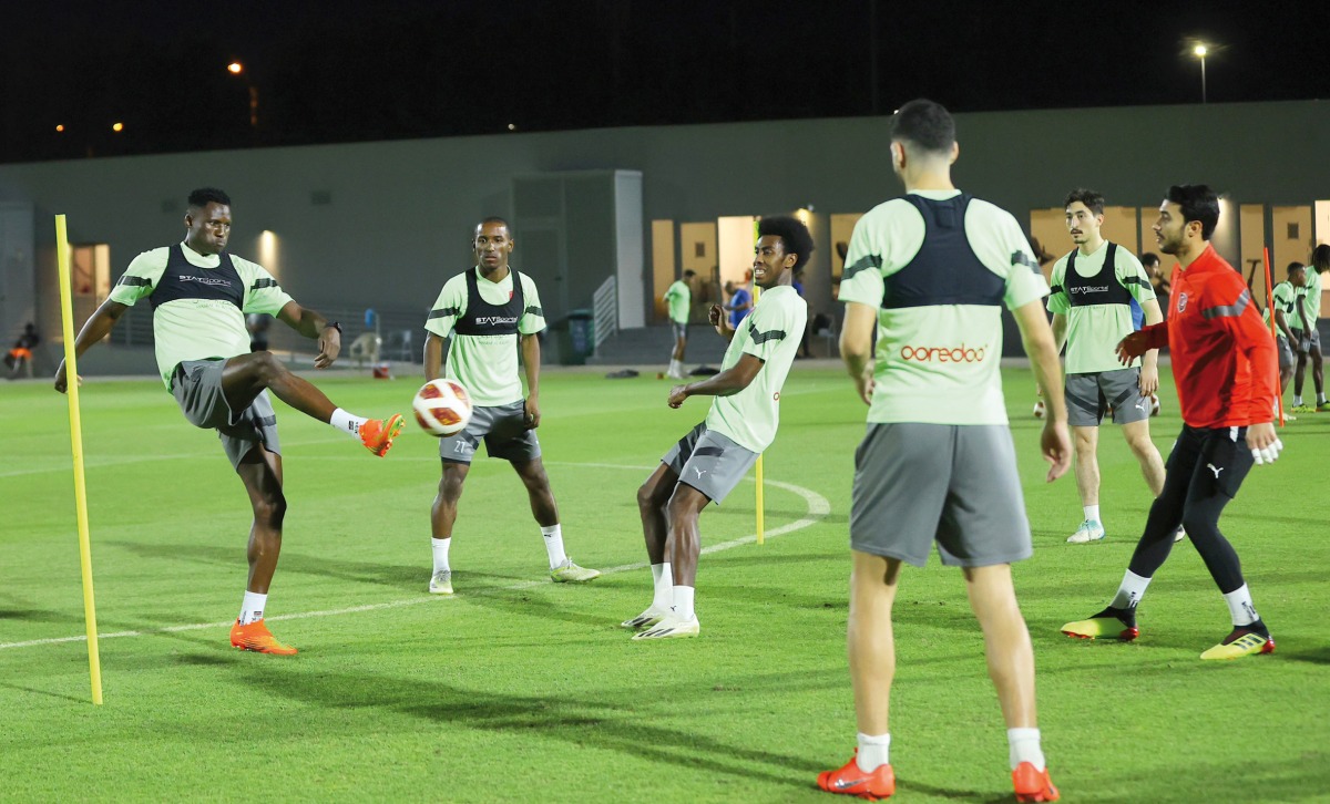 Al Duhail players take part in a training session. 