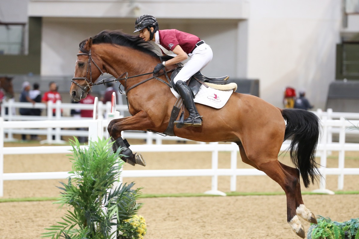 Action during the Al Shaqab League Show Jumping Championship at Longines Indoor Arena. 