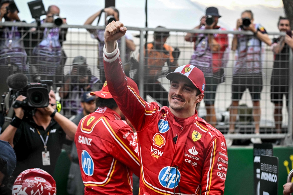 Ferrari's Monegasque driver Charles Leclerc celebrates after winning the Formula One Monaco Grand Prix on May 26, 2024 at the Circuit de Monaco. (Photo by ANDREJ ISAKOVIC / AFP)