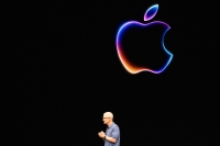 Apple CEO Tim Cook speaks during Apple's annual Worldwide Developers Conference (WDC) in Cupertino, California on June 10, 2024. (Photo by Nic Coury / AFP)

