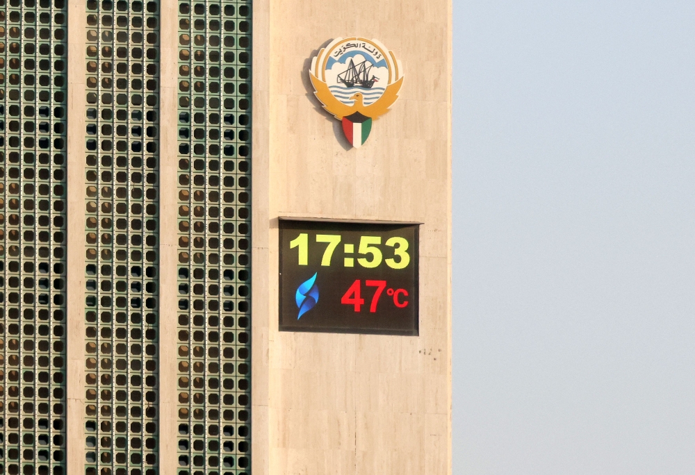 A thermometer on Kuwait's main governmental electricity control tower reads 47 degrees Celsius (116 Fahrenheit) at 17:53, in Kuwait City on June 19, 2024. (Photo by Yasser Al-Zayyat / AFP)