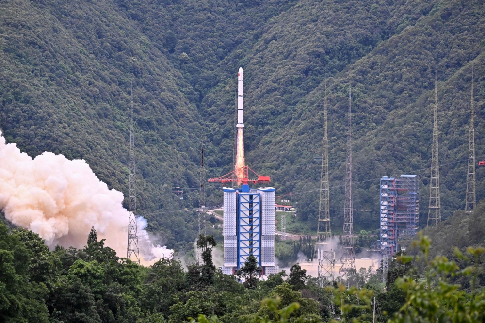 A Long March 2-C rocket carrying a satellite jointly developed by China and France dubbed the Space Variable Objects Monitor (SVOM), lifts off from a space base in Xichang, in China, on June 22, 2024. (Photo by Adek Berry / AFP)