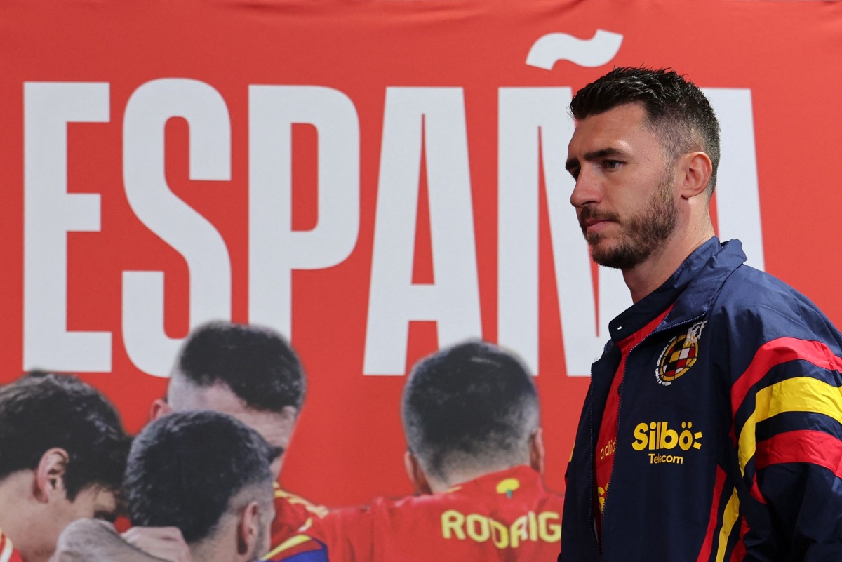 Spain's defender, Aymeric Laporte arrives for a press conference during the UEFA Euro 2024 European Football Championship, at the team's base camp in Donaueschingen, on June 22, 2024. (Photo by LLUIS GENE / AFP)
 