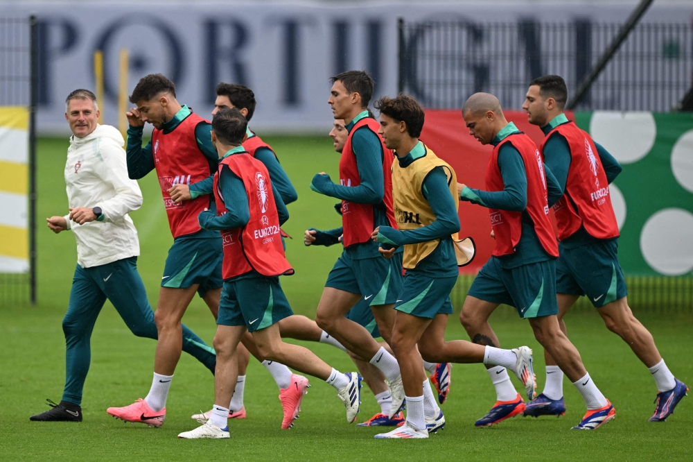 Portugal's players taker part in an MD-1 training session in Harsewinkel, on June 30, 2024. (Photo by Patricia De Melo Moreira / AFP)