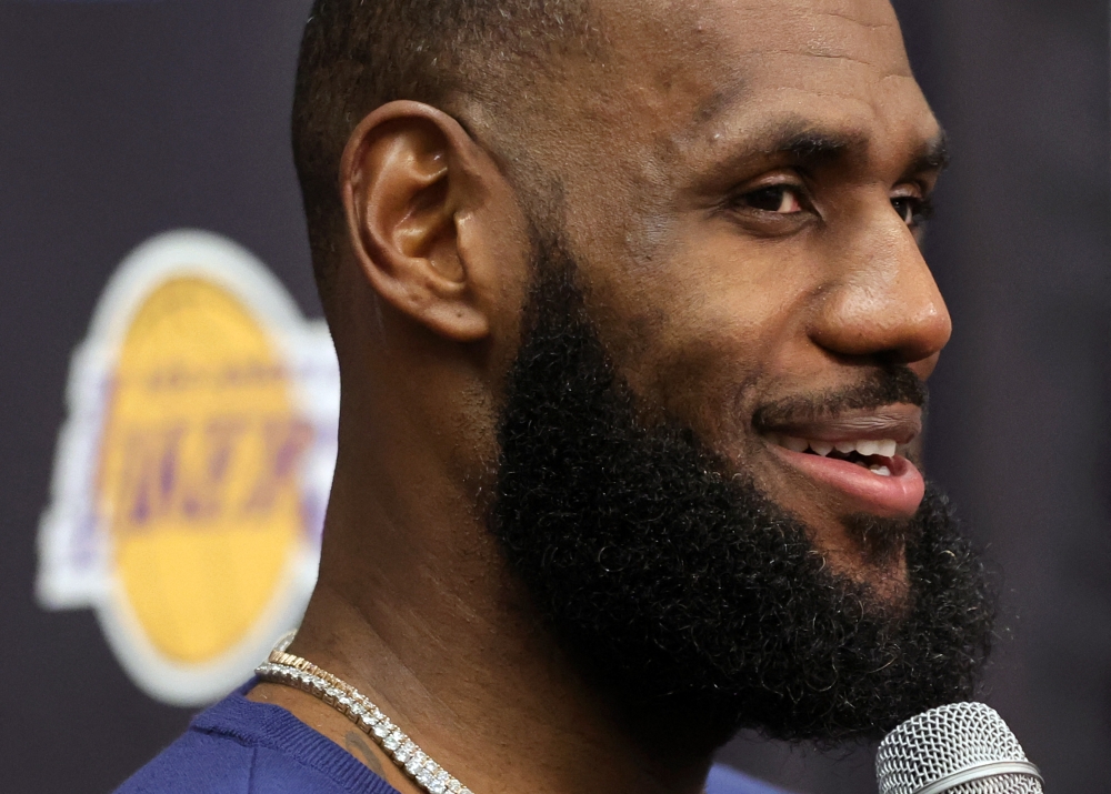 File: LeBron James #6 of the Los Angeles Lakers smiles during a news conference after a preseason game against the Phoenix Suns at T-Mobile Arena on October 05, 2022 in Las Vegas, Nevada. (Photo by Ethan Miller / Getty Images via AFP)