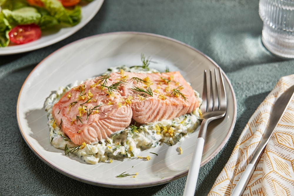 Poached Salmon With Yogurt, Zucchini and Herb Sauce. Picture: Tom McCorkle for The Washington Post