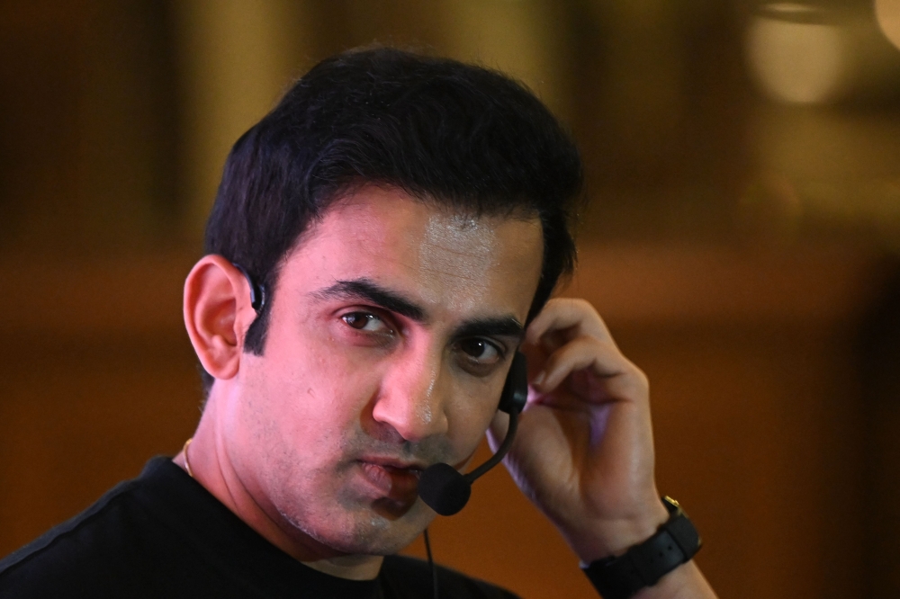 (FILES) Gautam Gambhir, former Indian cricket player and front-runner for team India's head coach, gestures during an event in Kolkata on June 22, 2024. (Photo by DIBYANGSHU SARKAR / AFP)
