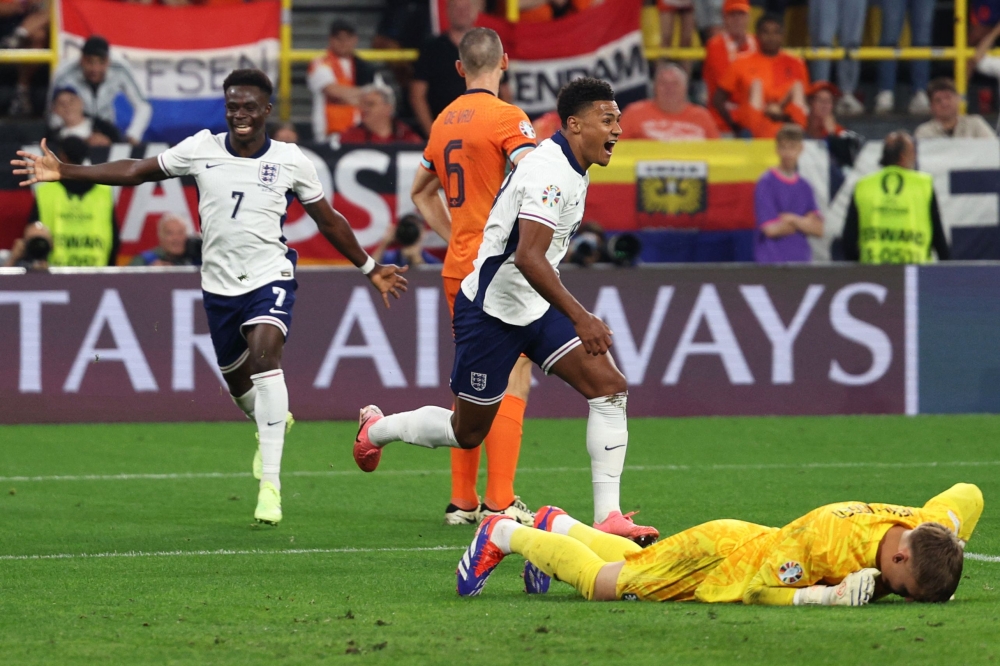 England's forward #19 Ollie Watkins celebrates after scoring his team's second goal during the UEFA Euro 2024 semi-final football match between the Netherlands and England at the BVB Stadion in Dortmund on July 10, 2024. (Photo by Adrian Dennis / AFP)