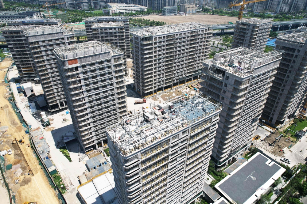 General view of an under-construction residential housing complex in Hangzhou in China's eastern Zhejiang province on July 15, 2024. (Photo by AFP) 