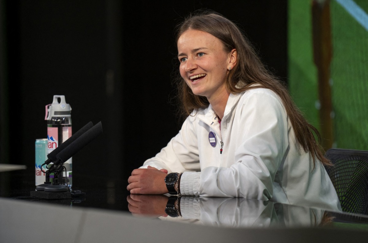 Czech Republic's Barbora Krejcikova attends a Press Conference in the Media Theatre in the Broadcast Centre, after winning against Italy's Jasmine Paolini in their women's singles final tennis match on the thirteenth day of the 2024 Wimbledon Championships at The All England Lawn Tennis and Croquet Club in Wimbledon, southwest London, on July 13, 2024. Photo by Joe TOTH / various sources / AFP