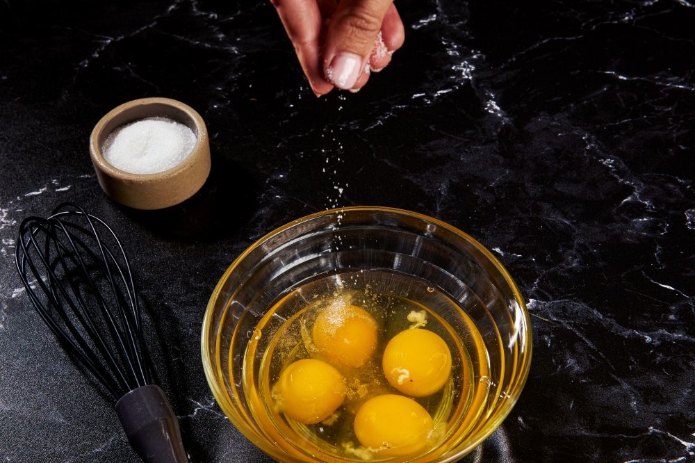 Salt eggs a few minutes before cooking for the best flavour and texture. Rey Lopez for The Washington Post; food styling by Lisa Cherkasky for The Washington Post