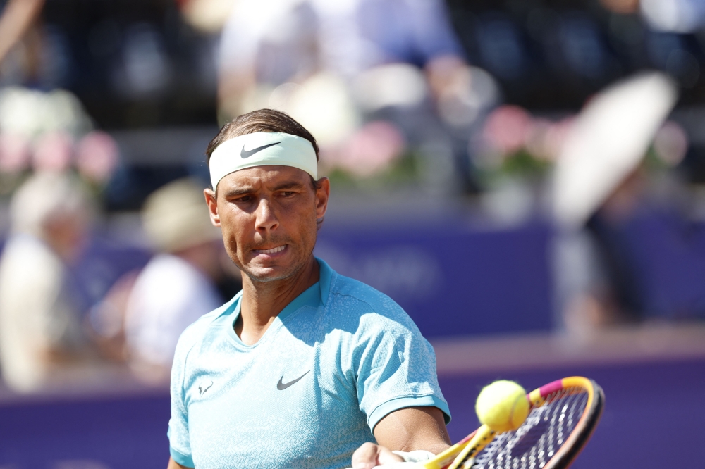 Spain's Rafael Nadal returns the ball to Croatia's Duje Ajdukovic during their men's semi-final singles match of the ATP Nordea Open tennis tournament in Bastad, Sweden, on July 20, 2024. (Photo by Adam Ihse/TT / TT News Agency / AFP)