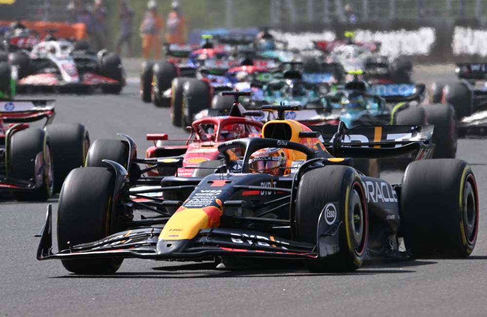 Red Bull Racing's Dutch driver Max Verstappen competes during the Formula One Hungarian Grand Prix at the Hungaroring race track in Mogyorod near Budapest on July 21, 2024. (Photo by Ferenc ISZA / AFP)