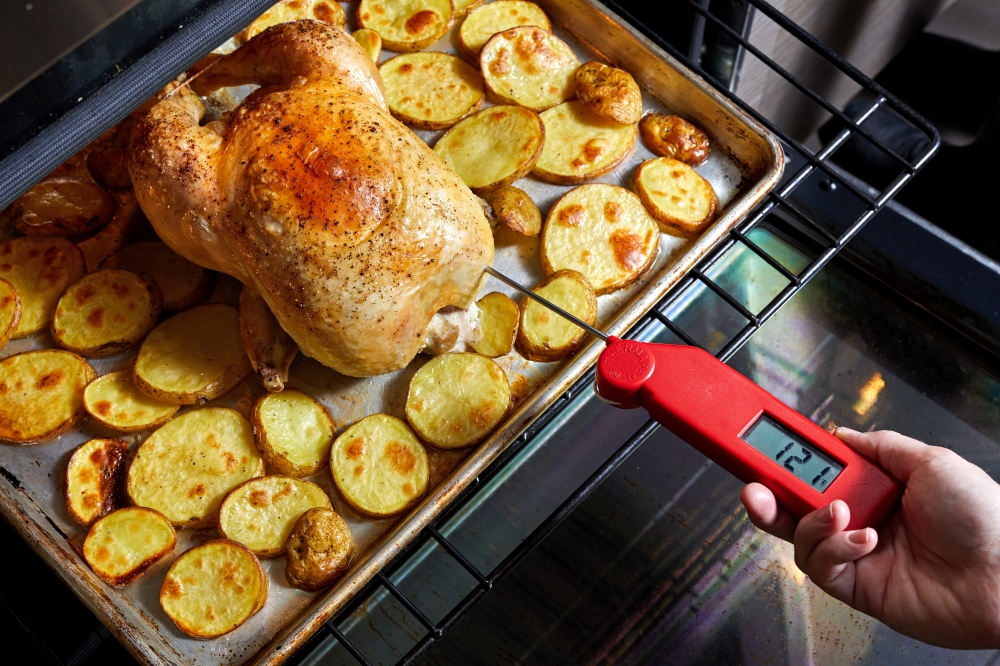 Monitor the temperature of chicken as you cook it to know when it's done. (Photo by Stacy Zarin Goldberg for The Washington Post)

