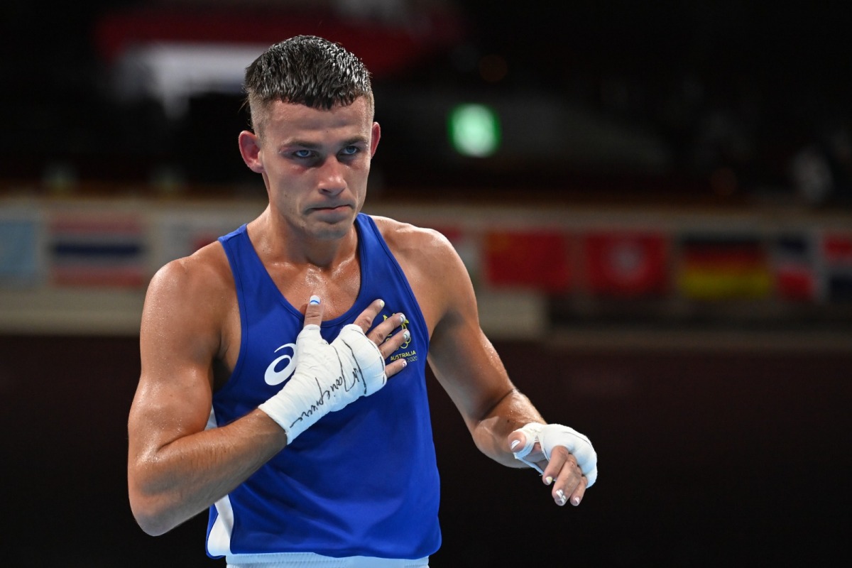 Tokyo 2020 Olympics - Boxing - Men's Lightweight - Quarterfinal - Kokugikan Arena - Tokyo, Japan - August 3, 2021 Harry Garside of Australia reacts after winning his fight Pool via REUTERS/Luis Robayo