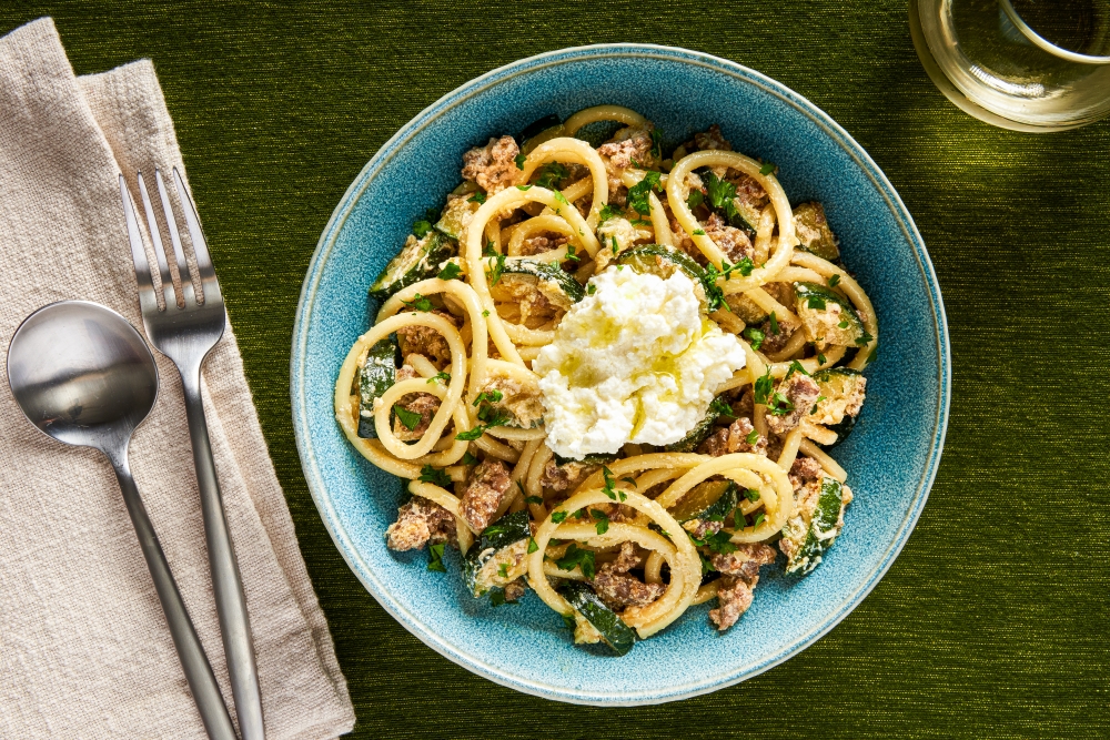 Bucatini with zucchini and sausage. (Photo by Rey Lopez for The Washington Post; food styling by Carolyn Robb for The Washington Post)

