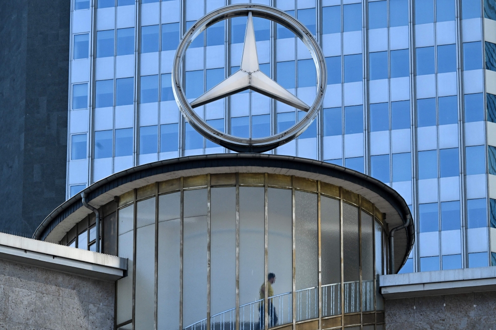 A giant Mercedes logo is pictured in Frankfurt am Main, western Germany, on September 11, 2023. Photo by Kirill KUDRYAVTSEV / AFP

