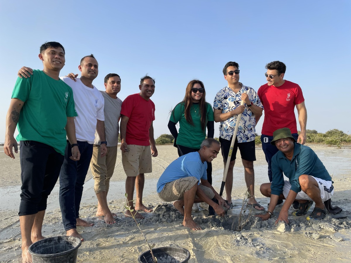 Zulal Wellness Resort staff plant seedlings to mark the International Day for the Conservation of the Mangrove Ecosystem.