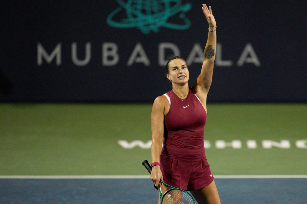 Aryna Sabalenka of Belarus waves to the crowd after winning the match against Victoria Azarenka of Belarus during Day 7 at William H.G. FitzGerald Tennis Center on August 02, 2024 in Washington, DC. Photo by Jess Rapfogel / GETTY IMAGES NORTH AMERICA / Getty Images via AFP