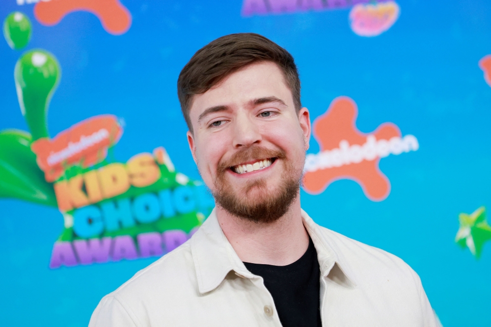 US YouTube personality Jimmy Donaldson, better known as MrBeast, arrives for the 36th Annual Nickelodeon Kids' Choice Awards at the Microsoft Theater in Los Angeles, on March 4, 2023. Photo by Michael Tran / AFP

