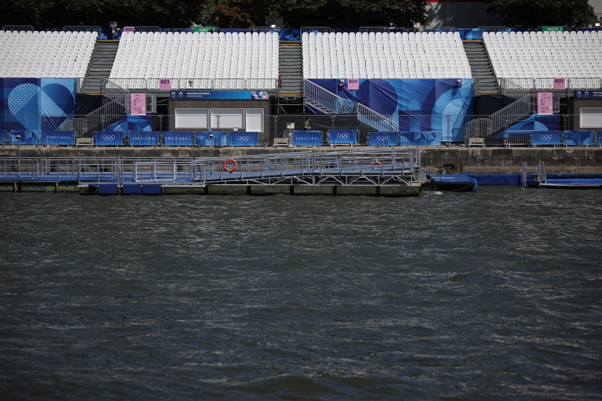 This photograph shows empty stands on the banks of the Seine river, after the first triathlon training session was cancelled during the Paris 2024 Olympic Games in Paris, on July 28, 2024, due to the pollution of the Seine river. Photo by Valentine CHAPUIS / AFP