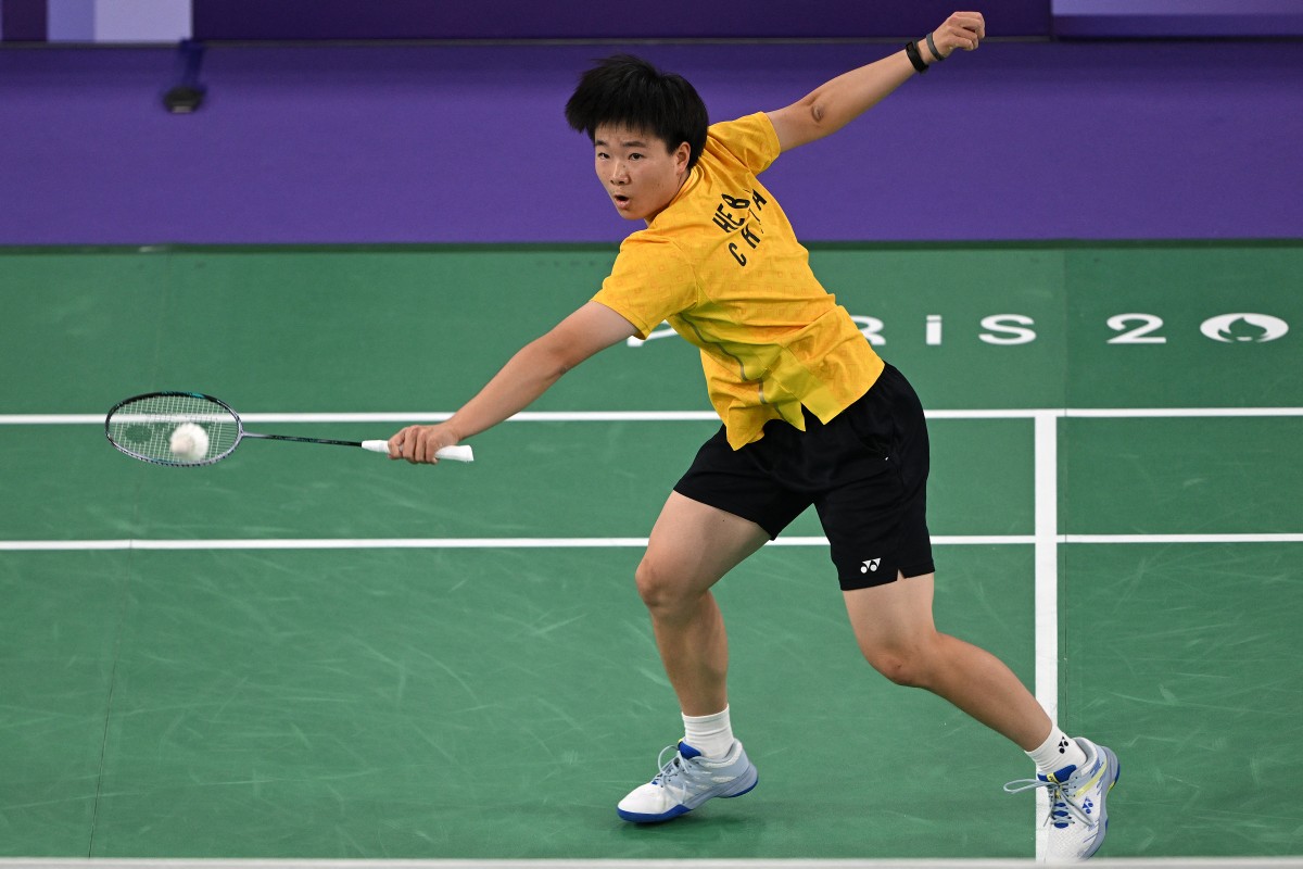 China's He Bing Jiao plays a shot to South Korea's An Se-young in their women's singles badminton final match during the Paris 2024 Olympic Games at Porte de la Chapelle Arena in Paris on August 5, 2024. Photo by ARUN SANKAR / AFP.