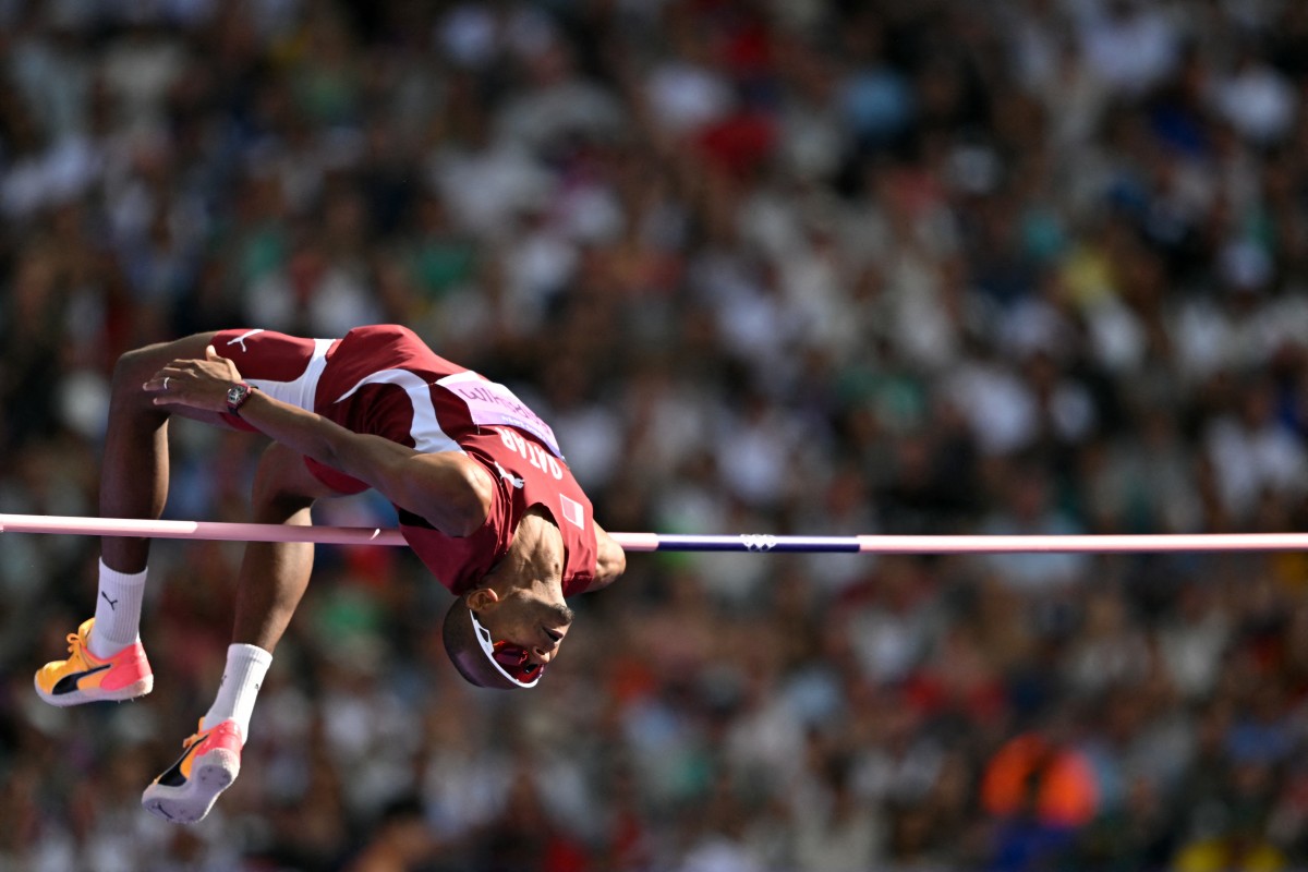 Qatar's Mutaz Essa Barshim competes in the men's high jump qualification of the athletics event at the Paris 2024 Olympic Games at Stade de France in Saint-Denis, north of Paris, on August 7, 2024. Photo by Andrej ISAKOVIC / AFP.