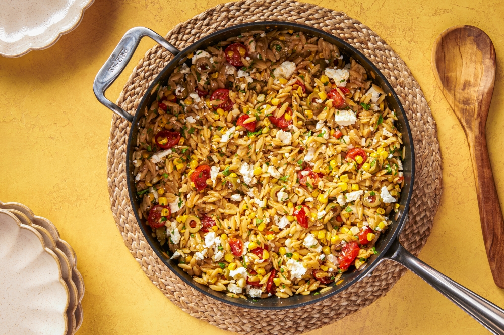 Skillet orzo with corn, tomatoes and feta. (Photo by Rey Lopez for The Washington Post; food styling by Carolyn Robb for The Washington Post)

