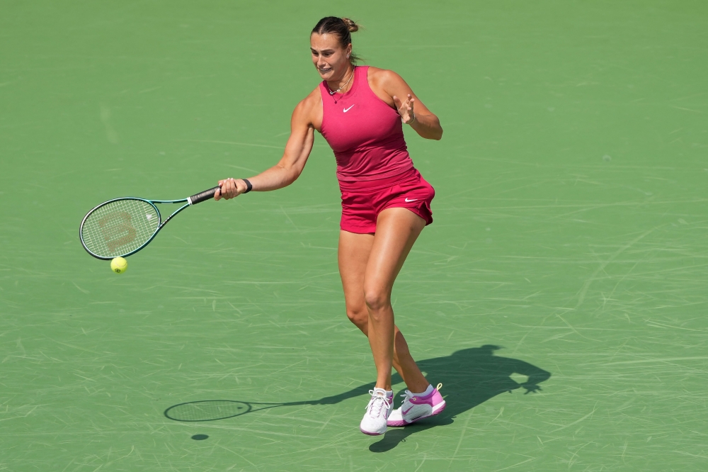 Aryna Sabalenka plays a forehand during her match against Jessica Pegula of the United States during the Final Day of the Cincinnati Open at the Lindner Family Tennis Center on August 19, 2024 in Mason, Ohio. (Photo by Dylan Buell / GETTY IMAGES NORTH AMERICA / Getty Images via AFP)
