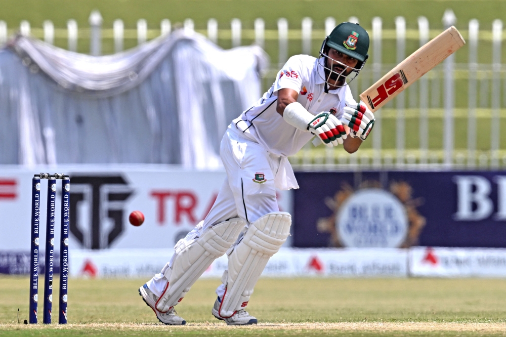 Bangladesh's Shadman Islam plays a shot during the third day of first Test cricket match between Pakistan and Bangladesh at the Rawalpindi Cricket Stadium in Rawalpindi on August 23, 2024. (Photo by Farooq NAEEM / AFP)
