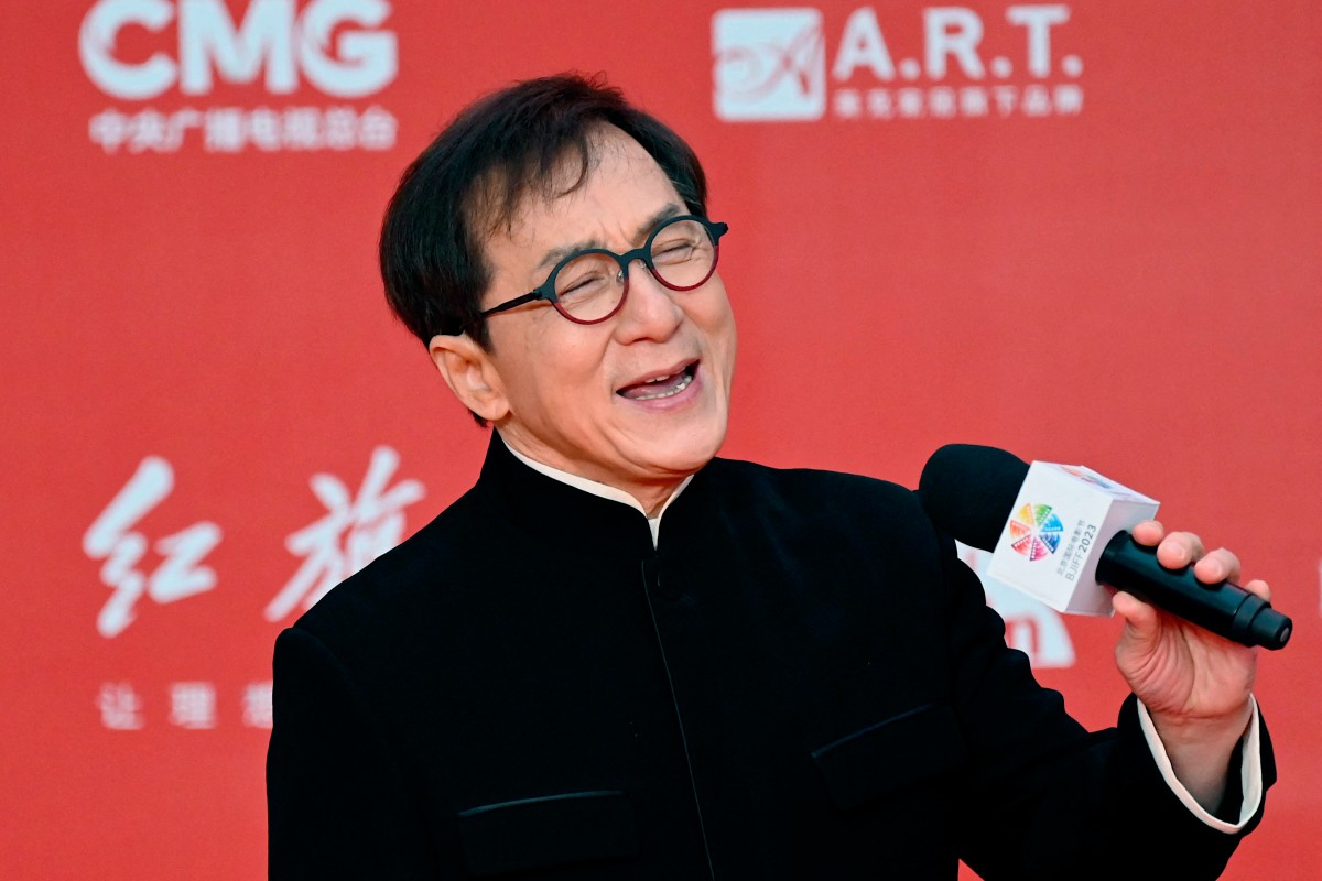 Hong Kong actor Jackie Chan sings on the red carpet during the opening ceremony of the 13th Beijing International Film Festival (BJIFF) in Beijing, on April 21, 2023. Photo by Jade GAO / AFP.