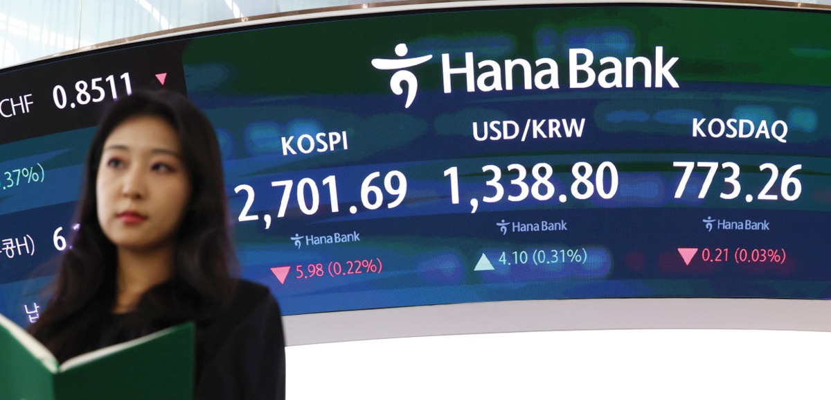 An electronic board shows the Kospi’s slight downtick in a dealing room at the Hana Bank headquarters in Seoul, S Korea.