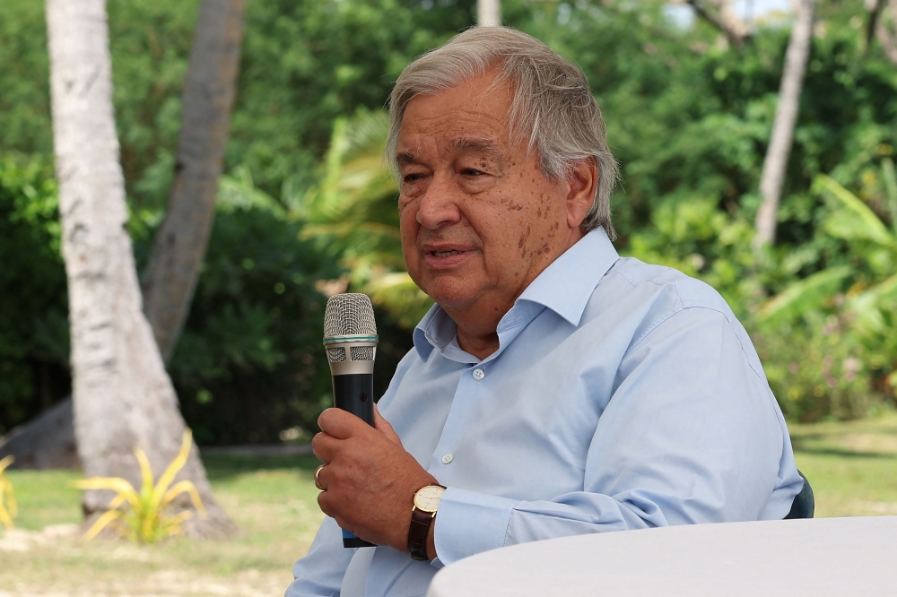 United Nations Secretary-General Antonio Guterres makes remarks during a site visit to the Ha'atafu Beach, an area affected by the volcanic eruption and tsunami in 2022, in Tongatapu on August 27, 2024. Photo by TUPOU VAIPULU / AFP