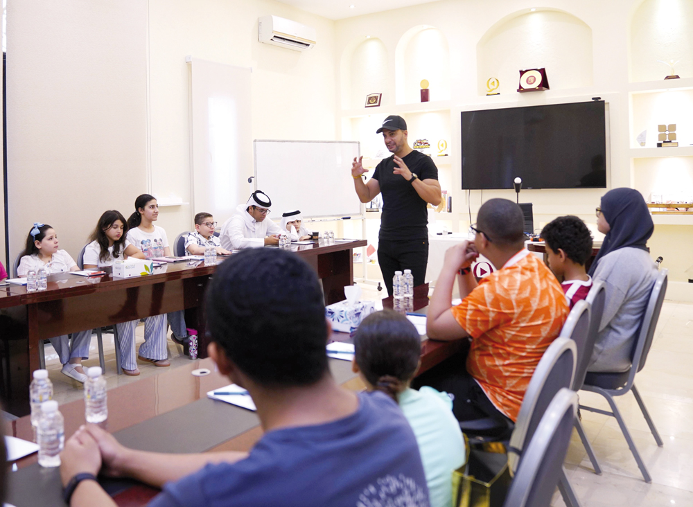 A trainer taking a class for the participants.