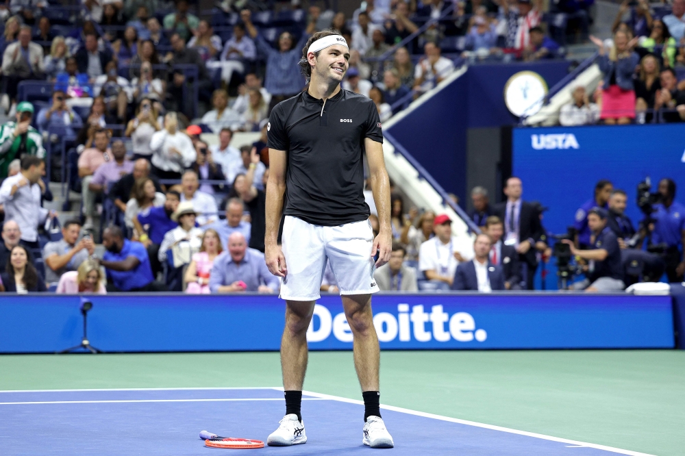 Taylor Fritz of the United States celebrates after defeating Frances Tiafoe of the United States in their Men's Singles Semifinal match at USTA Billie Jean King National Tennis Center on September 06, 2024. Jamie Squire/Getty Images/AFP 